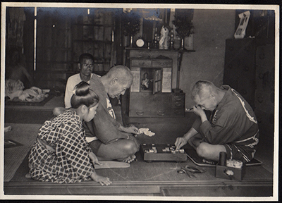 Playing shogi in Japan between 1916 and 1918.